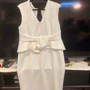 Dress from VENUS. White in color white a zipper in the front. Size 16